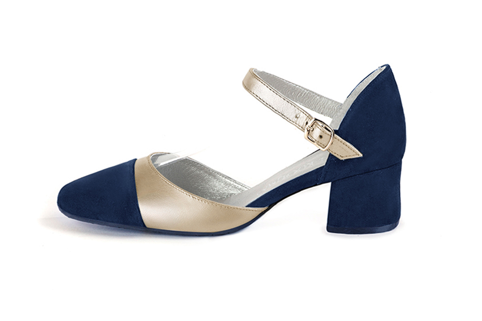 Women's navy blue and gold open side dress shoes, with an instep strap. Round toe. Low flare heels - Profile view